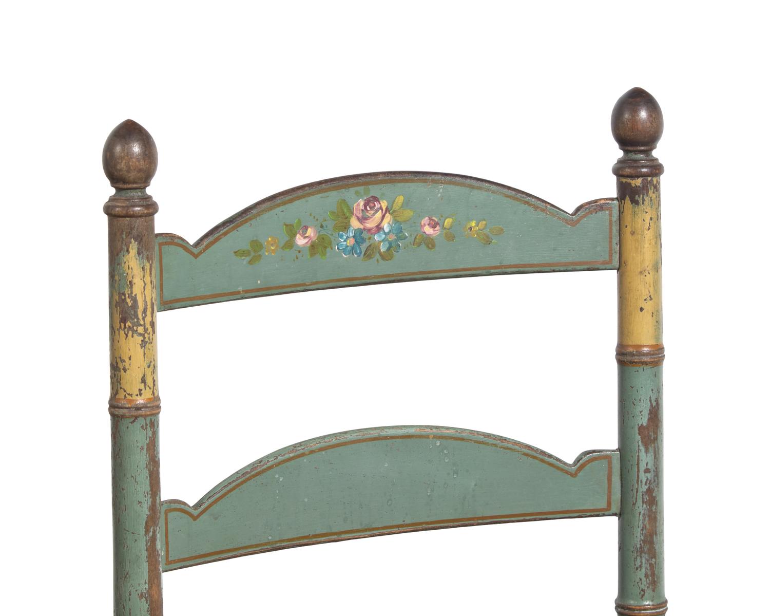 A Pair of Green-Painted and Decorated Ladder-Back Rush-Seat Side Chairs
