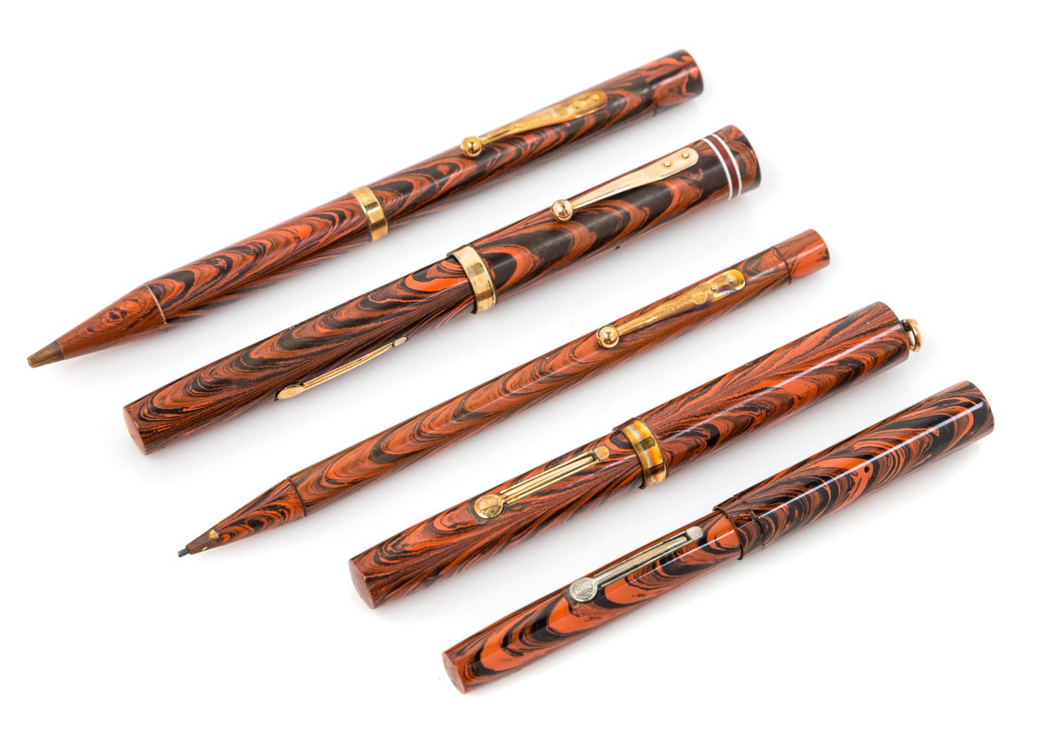 A Collection of Five Vintage Waterman's Writing Instruments Length of longest 5 1/2 inches.