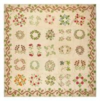 An Appliqued, Trapunto and Embroidered Quilt