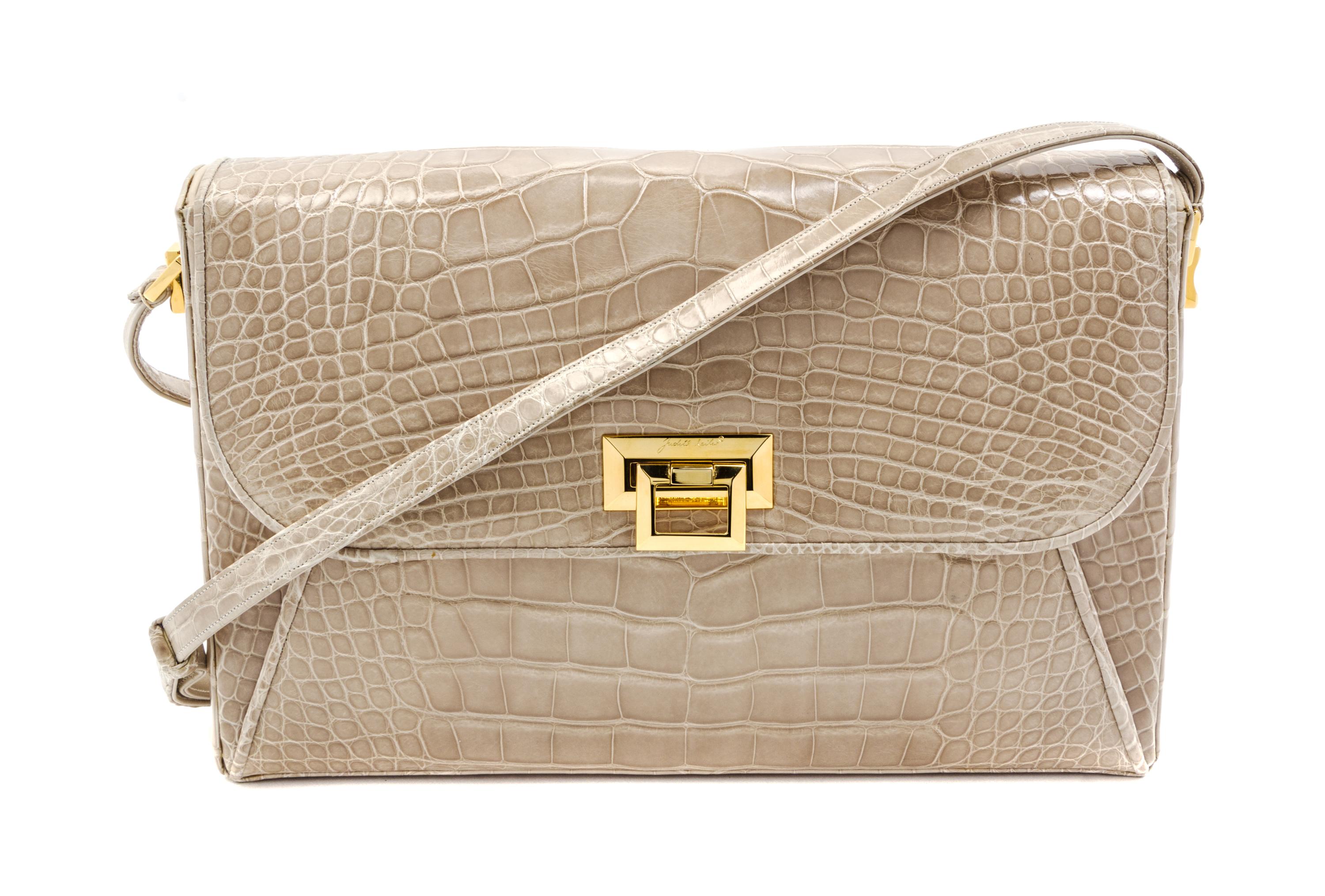 A Judith Leiber Taupe Alligator Shoulder Bag, 12 x 7 1/2 x 2 inches.