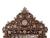 A Pair of Levantine Mother-of-Pearl and Abalone-Inlaid Carved Walnut Mirrors