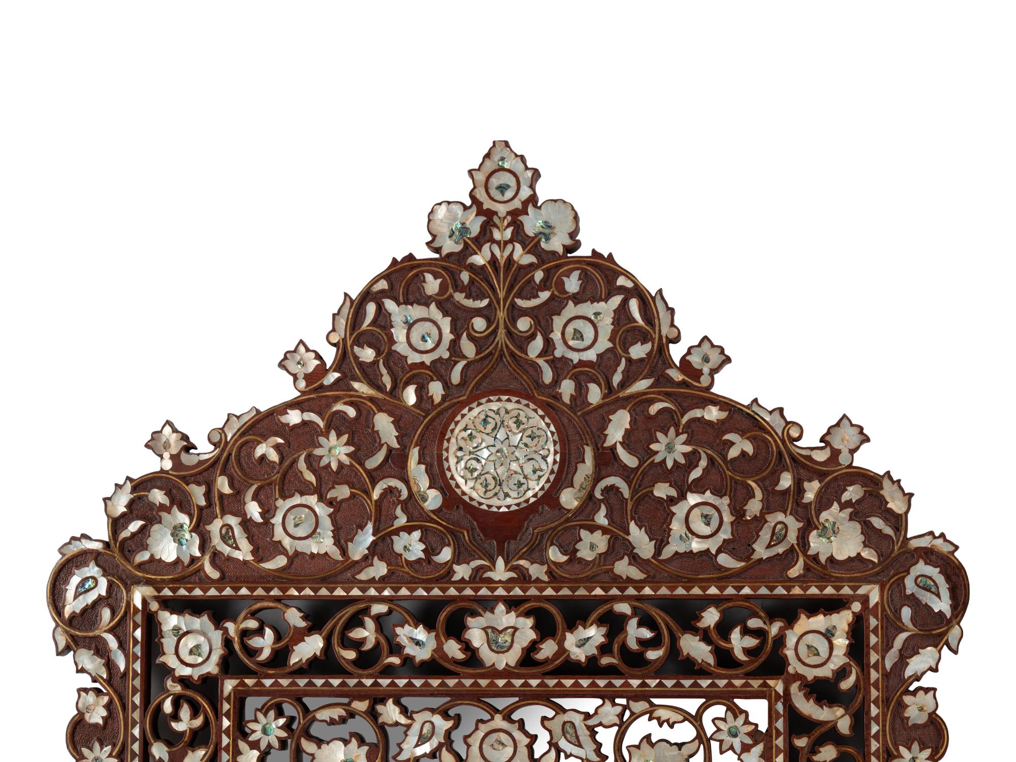 A Pair of Levantine Mother-of-Pearl and Abalone-Inlaid Carved Walnut Mirrors