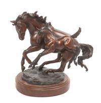 An American Bronze Figure Width 12 inches. — Cammie Lundeen (b. 1957)
