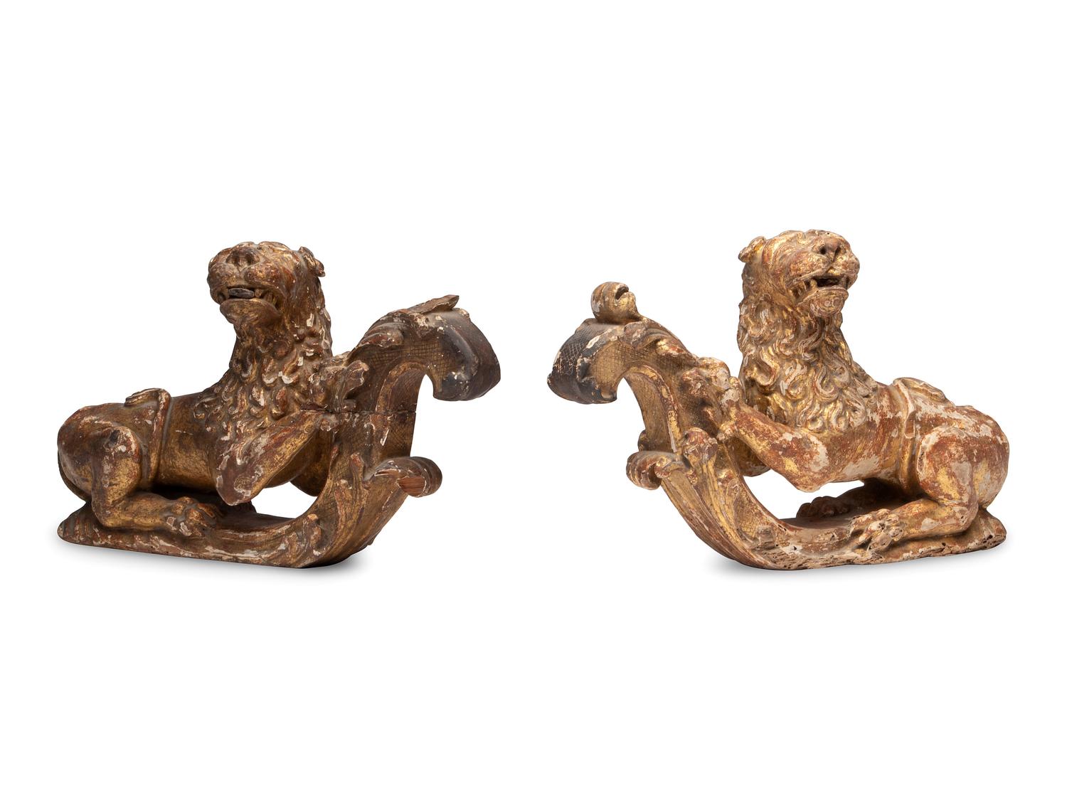 A Pair of Regency Giltwood Lion Mounts