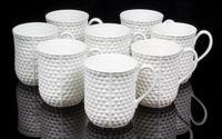 A Set of Ten Irish Porcelain Mugs Retailed by Tiffany & Co. Height 3 7/8 inches — SECOND HALF 20TH CENTURY