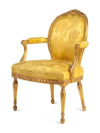 A Pair of George III Carved Giltwood Armchairs