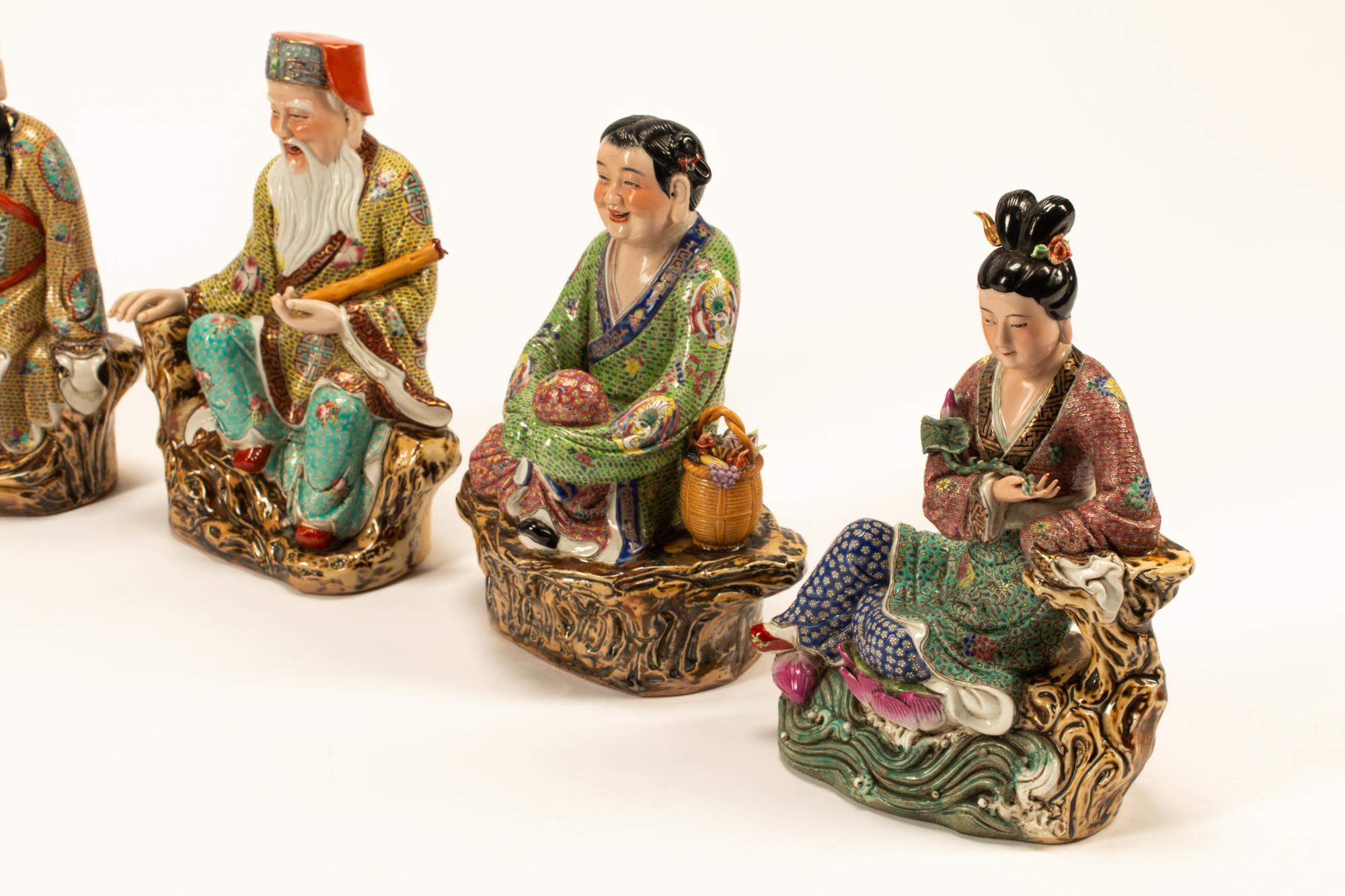 A Set of Eight Chinese Enameled Porcelain Figures of Immortals