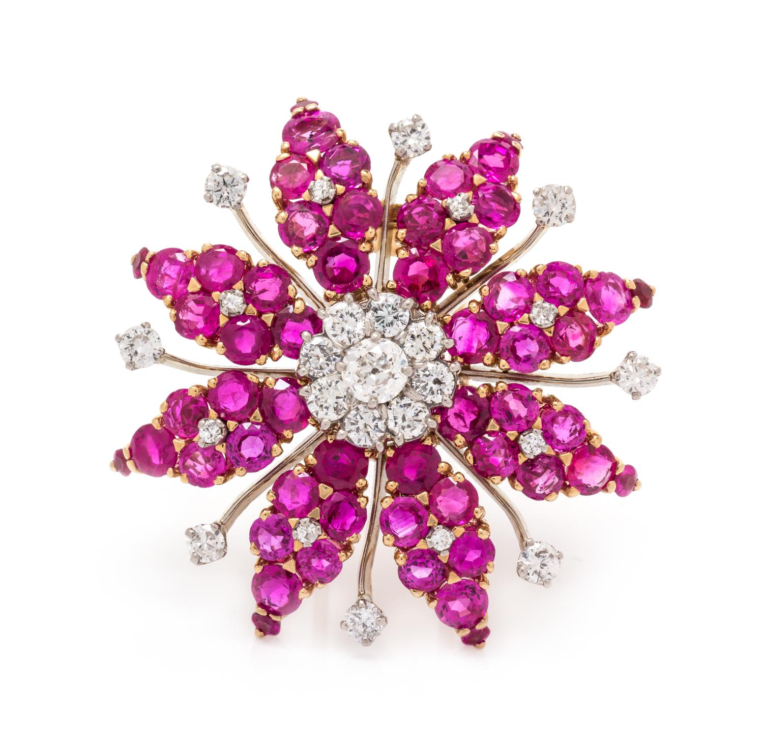 A Rose Gold, Platinum, Ruby and Diamond Brooch, 15.30 dwts.