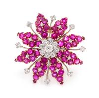 A Rose Gold, Platinum, Ruby and Diamond Brooch, 15.30 dwts.