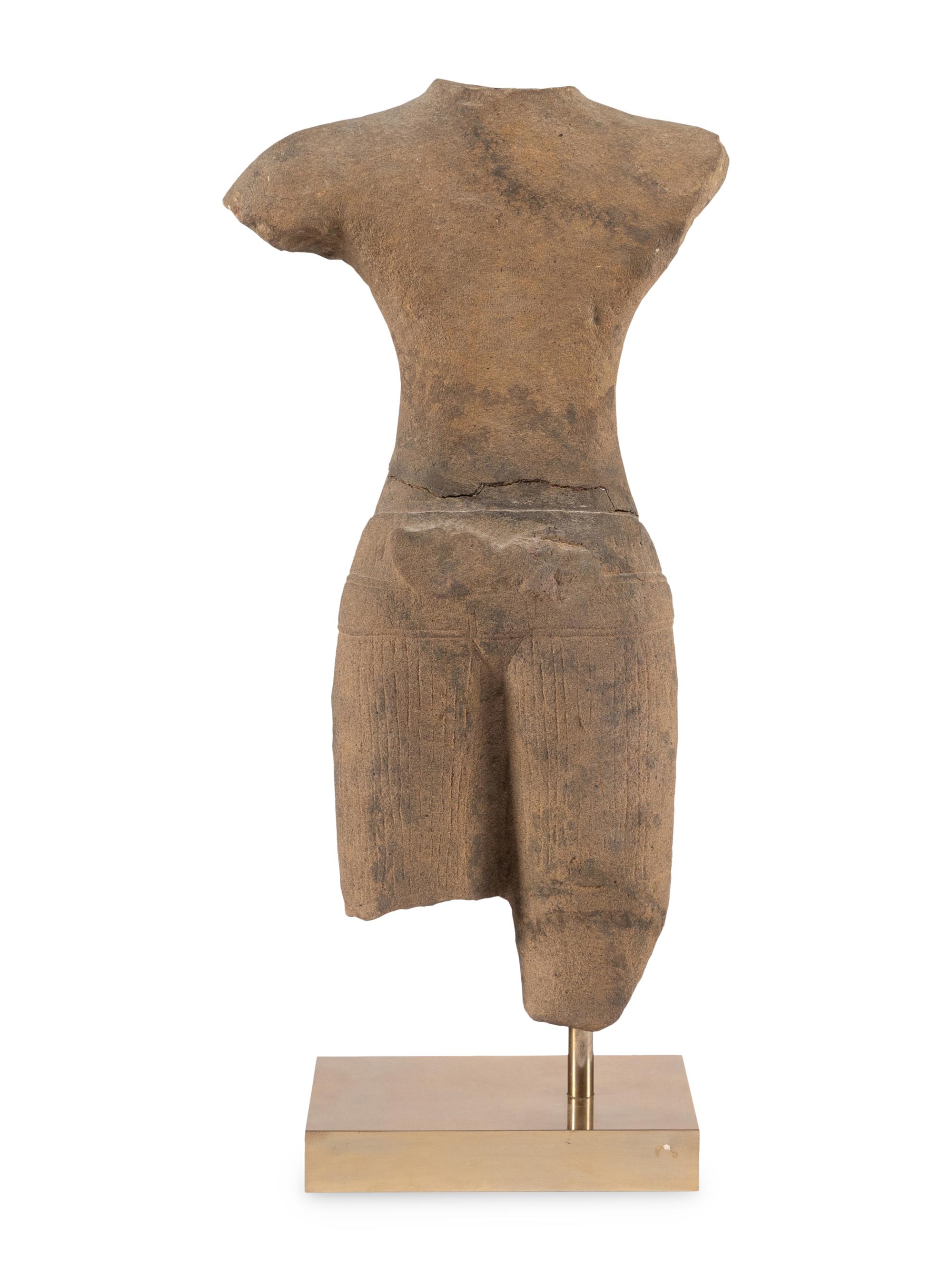 A Khmer Sandstone Torso of a Male Deity