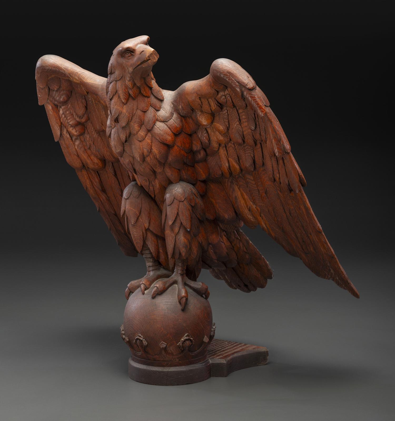 A Carved Wood Eagle Finial