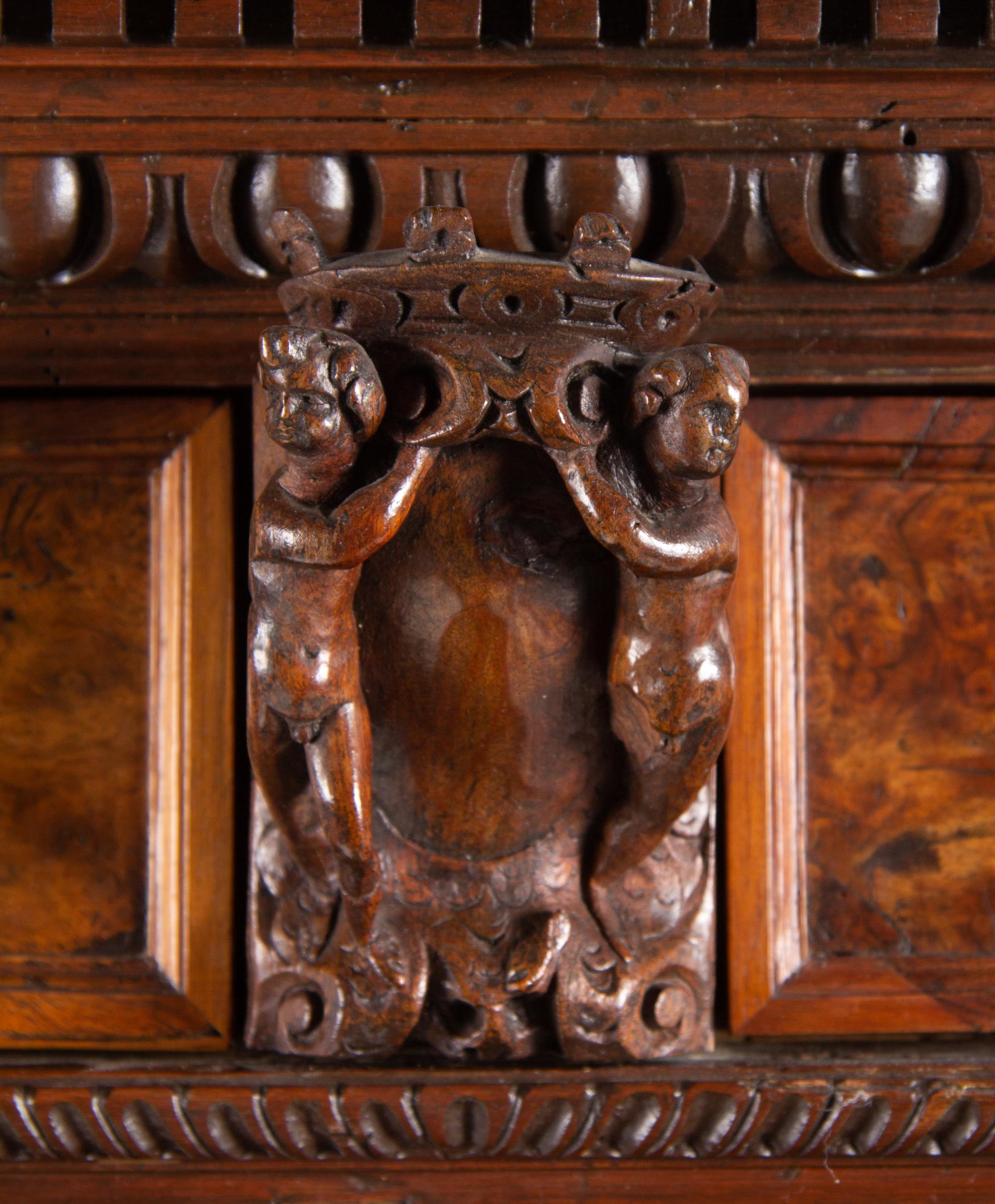 An Italian Baroque Style Carved Walnut and Burl Walnut Fall-Front Bureau Cabinet
