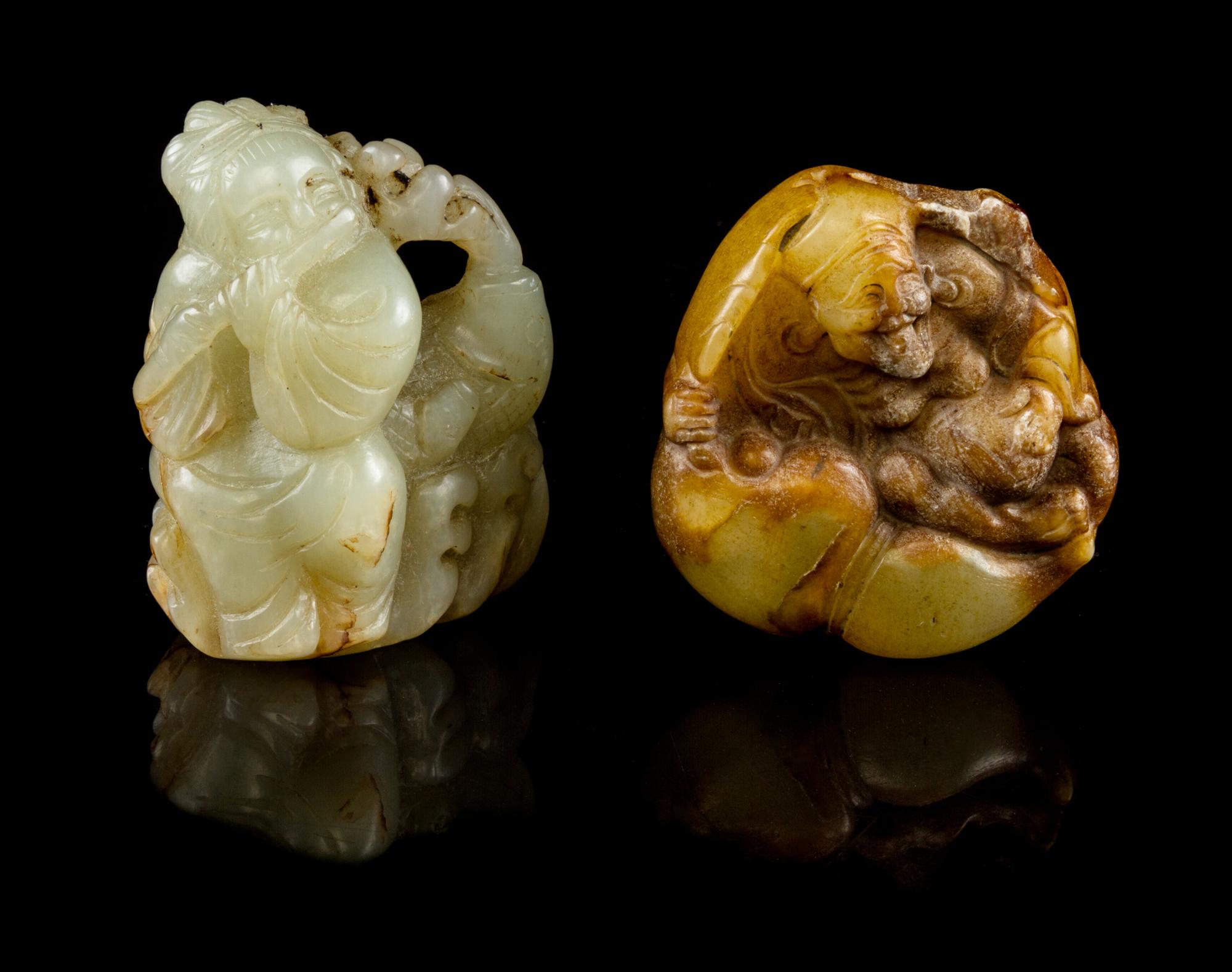 Two Carved Jade Figural Toggles Height of first 2 1/4 inches.