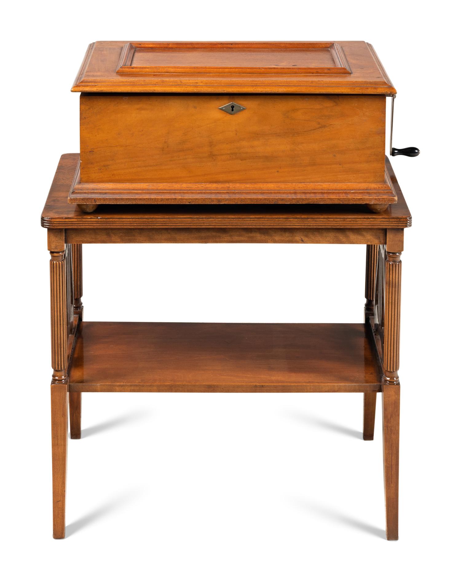 A Capitol B Cuff Music Box with Table, by F.G. Otto & Son