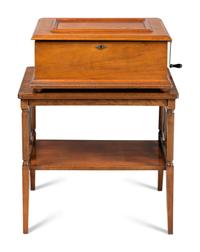 A Capitol B Cuff Music Box with Table, by F.G. Otto & Son