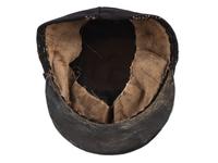 [CIVIL WAR]. A collection of items attributed to Thomas W. Johnson, Co. K, 4th Delaware Infantry, incl. frock coat, cap, belt rig, and cartridge box.