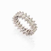 A Diamond and 18K White Gold Eternity Band