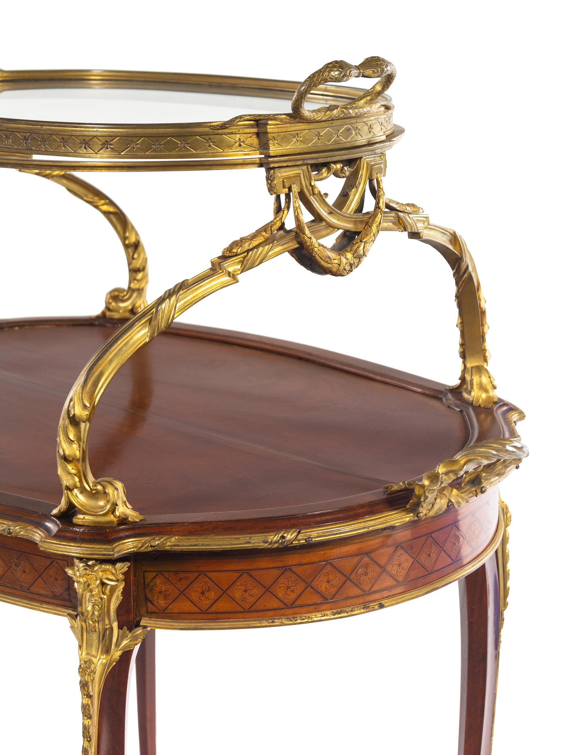 A Louis XV Style Gilt Bronze and Porcelain Mounted Two-Tier Serving Table