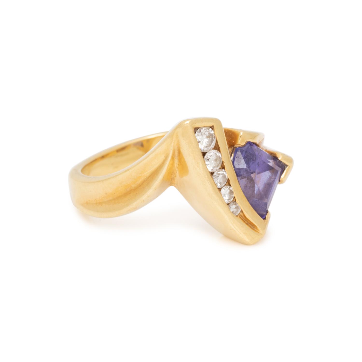 JOHN ATENCIO, TANZANITE AND DIAMOND RING