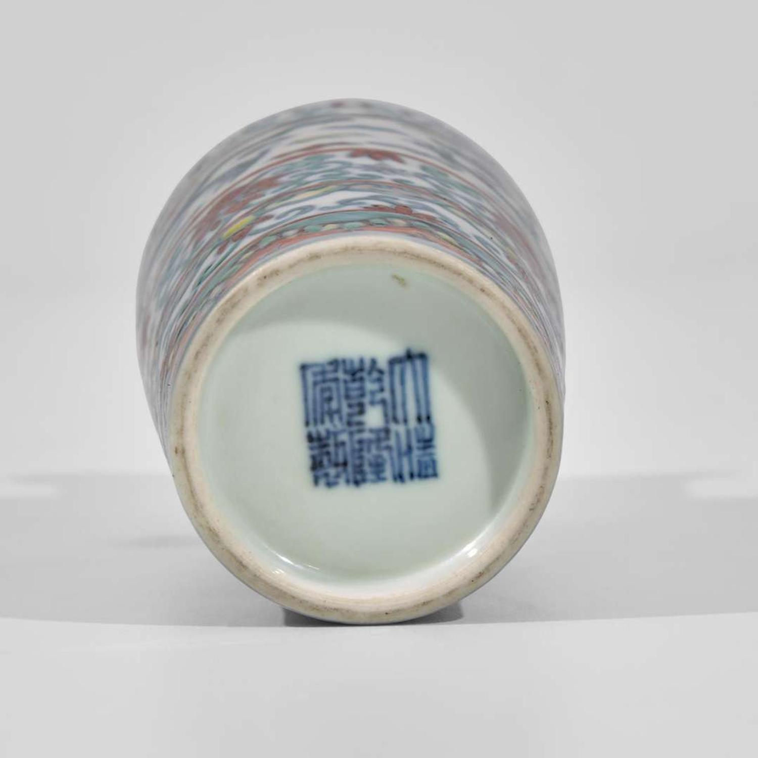 A Chinese Dehua porcelain small tripod censer and a small doucai vase 德化窑三足香炉及斗彩小花尊一件 17th/18th century and later ??????? ???