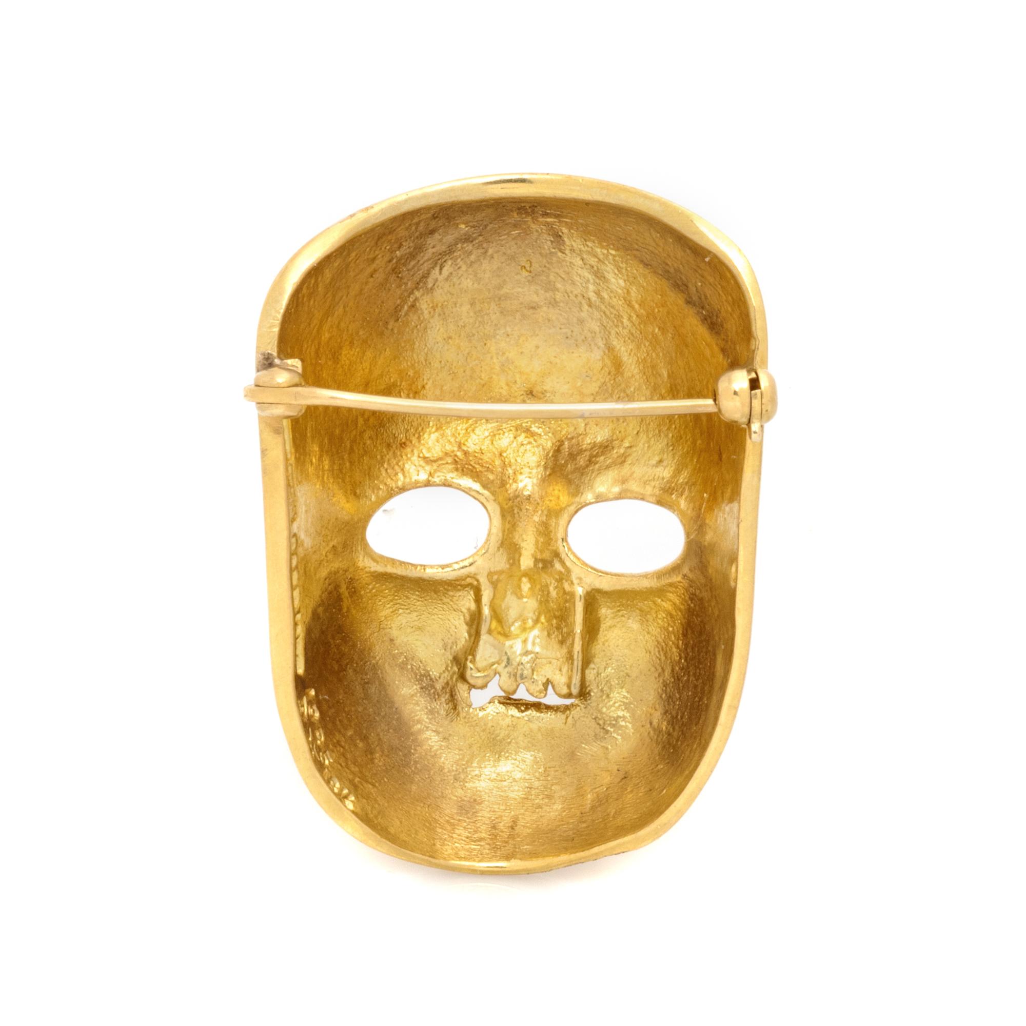 KIESELSTEIN-CORD, YELLOW GOLD MASK BROOCH