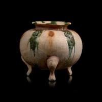 A Chinese Sancai Glazed Tripod Censer, Tang Dynasty 唐 三彩貼塑三足罐