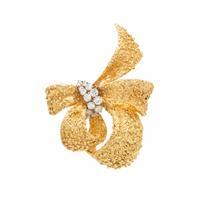 YELLOW GOLD AND DIAMOND BOW BROOCH