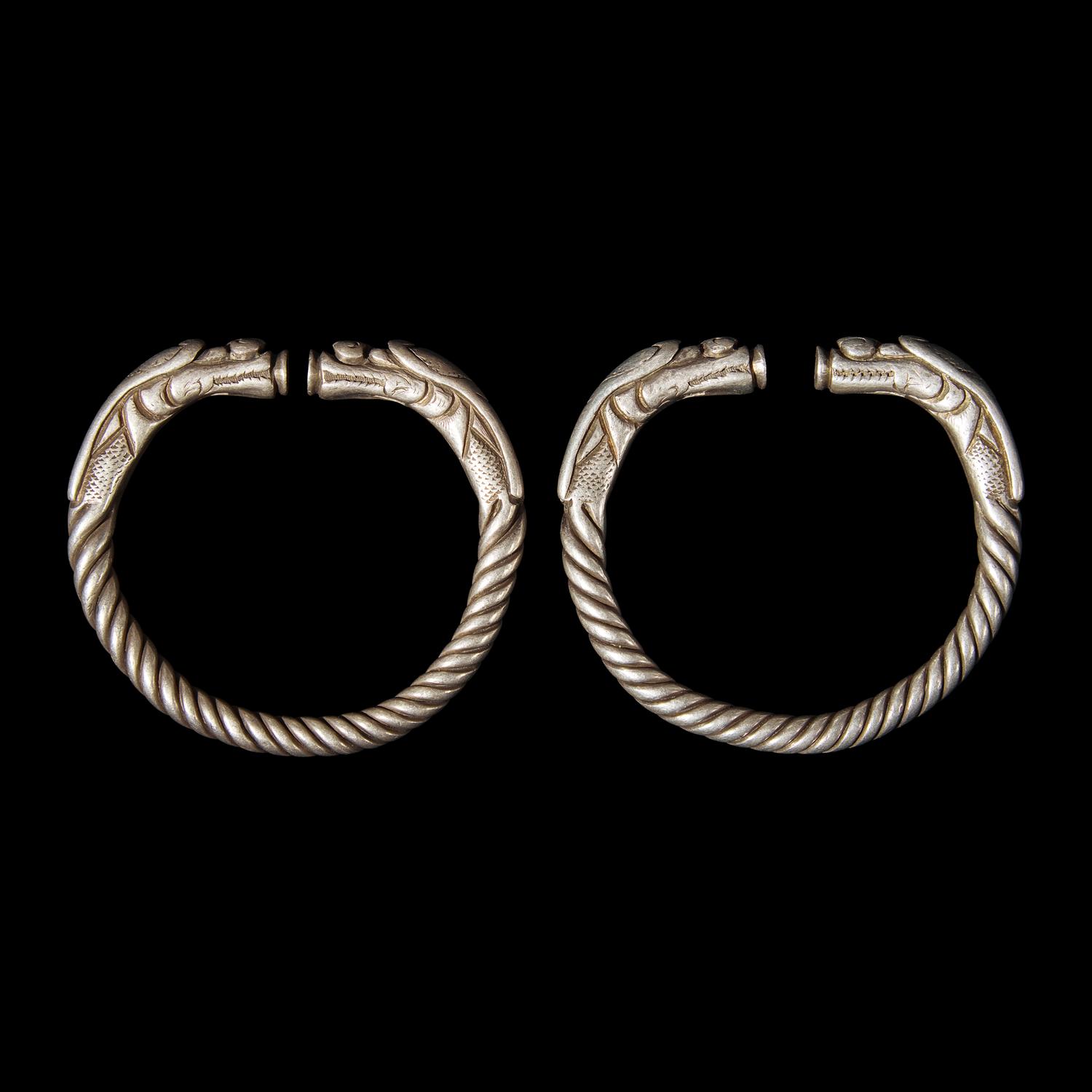 Six Chinese Silver 'Dragon' Bracelets, Qing Dynasty 清 銀龍頭紋鐲六隻