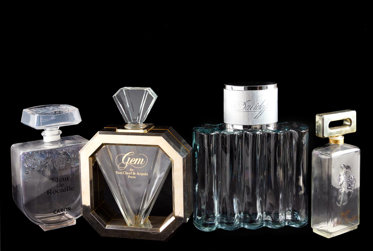 A Group of Four Factice Perfume Bottles