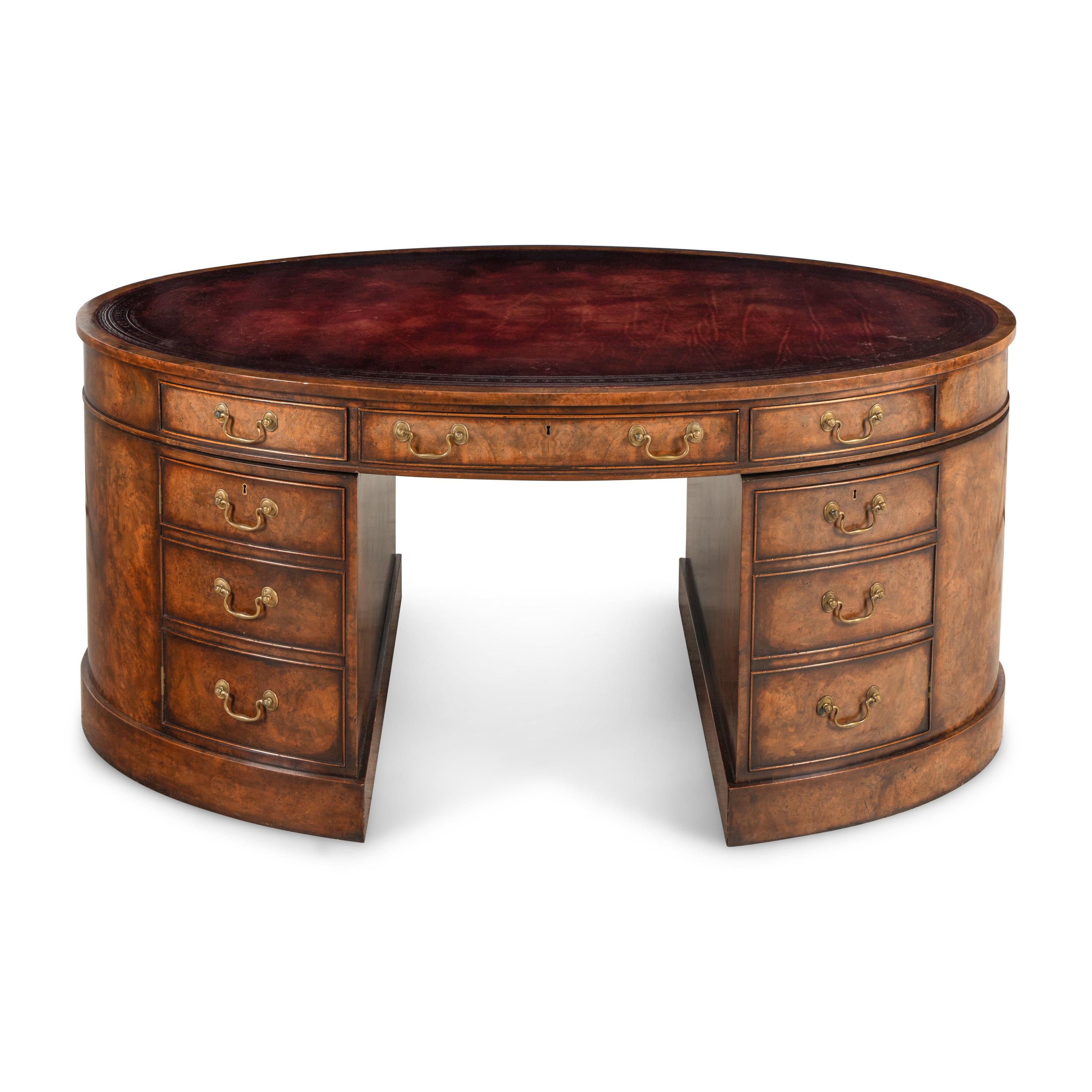 An English Burl Walnut Oval Partners Desk