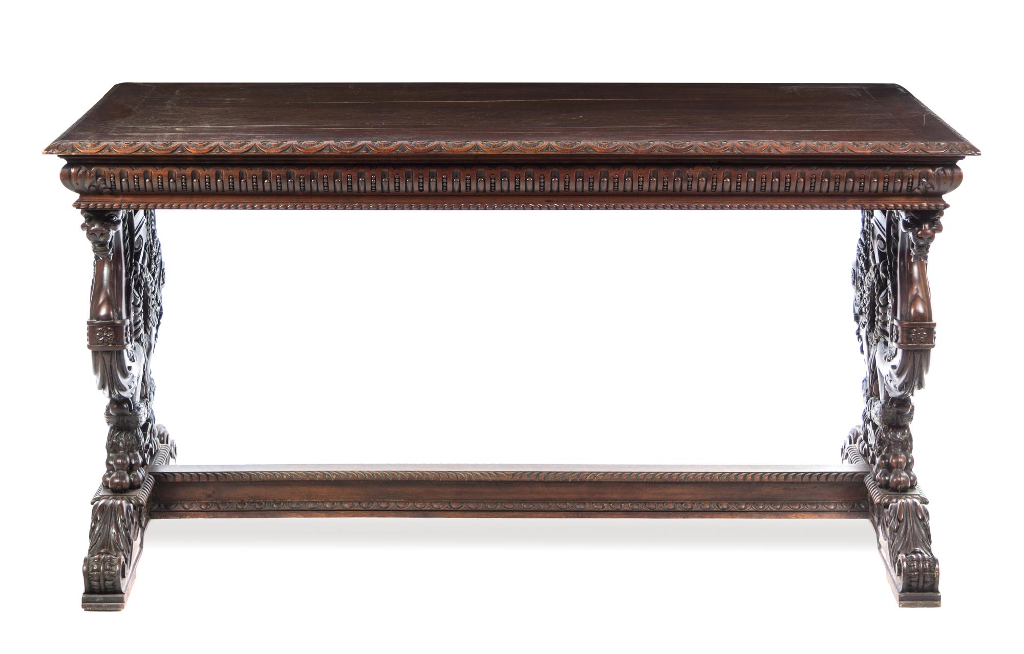 A Renaissance Revival Mahogany Library Table Height 31 x width 58 1/4 x depth 31 7/8 inches. — LATE 19TH/EARLY 20TH CENTURY