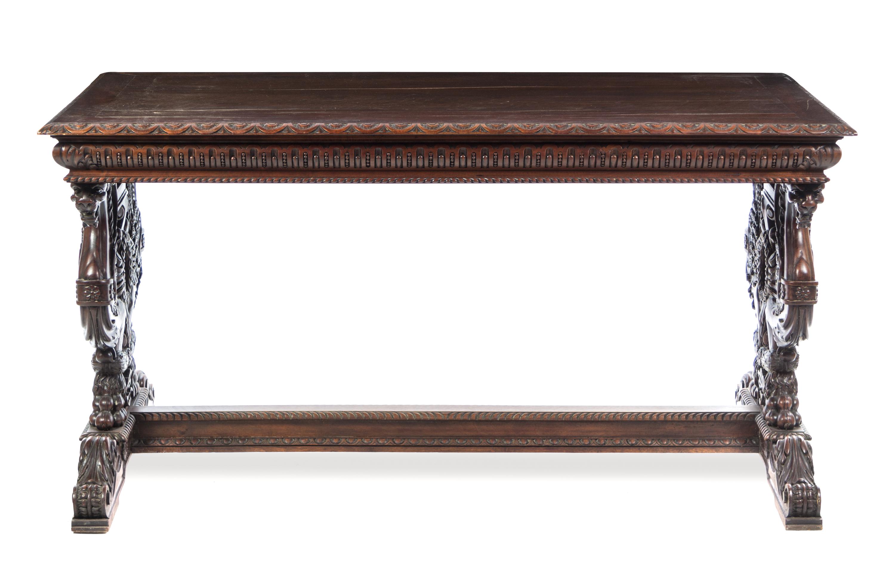 A Renaissance Revival Mahogany Library Table Height 31 x width 58 1/4 x depth 31 7/8 inches. — LATE 19TH/EARLY 20TH CENTURY