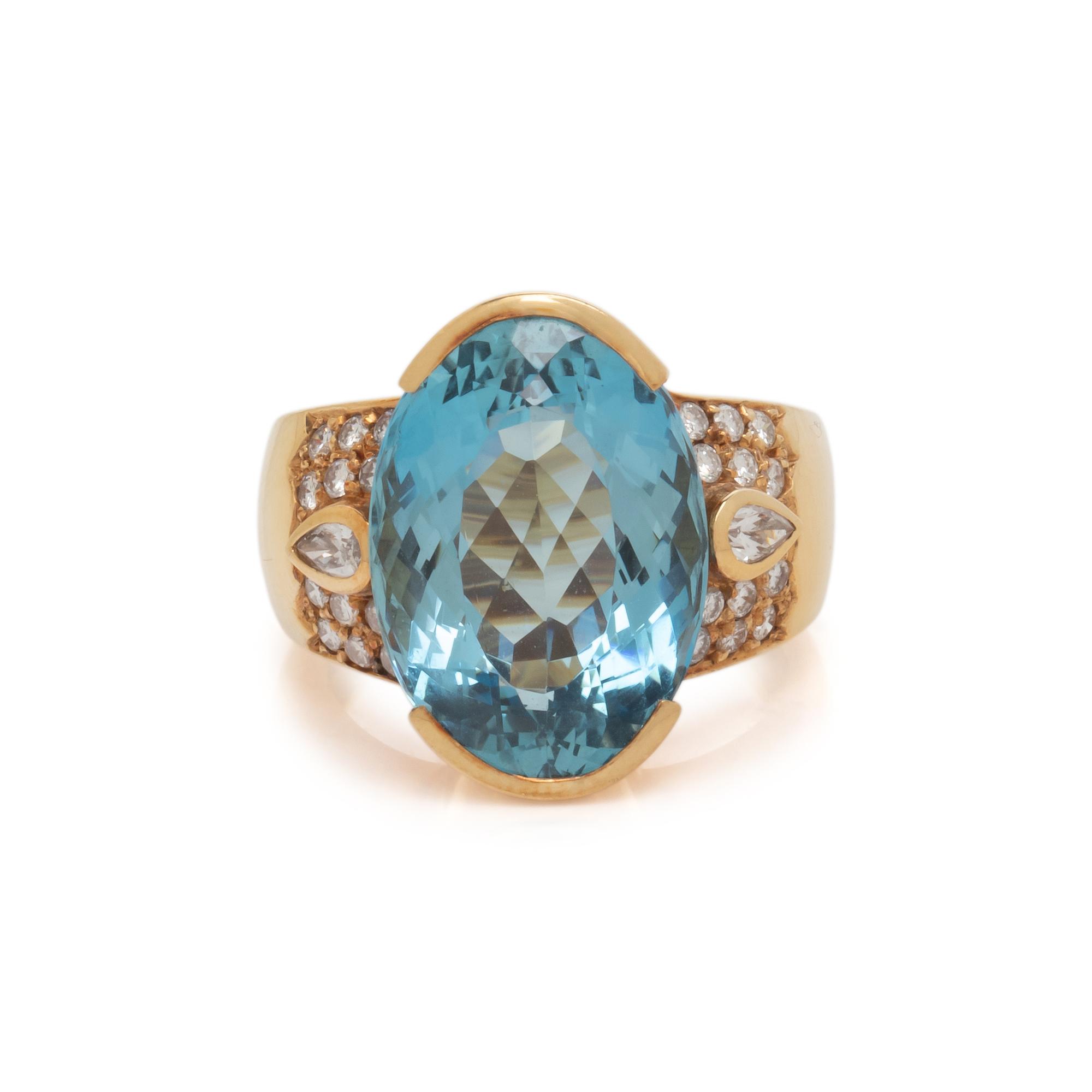 YELLOW GOLD, AQUAMARINE, AND DIAMOND RING