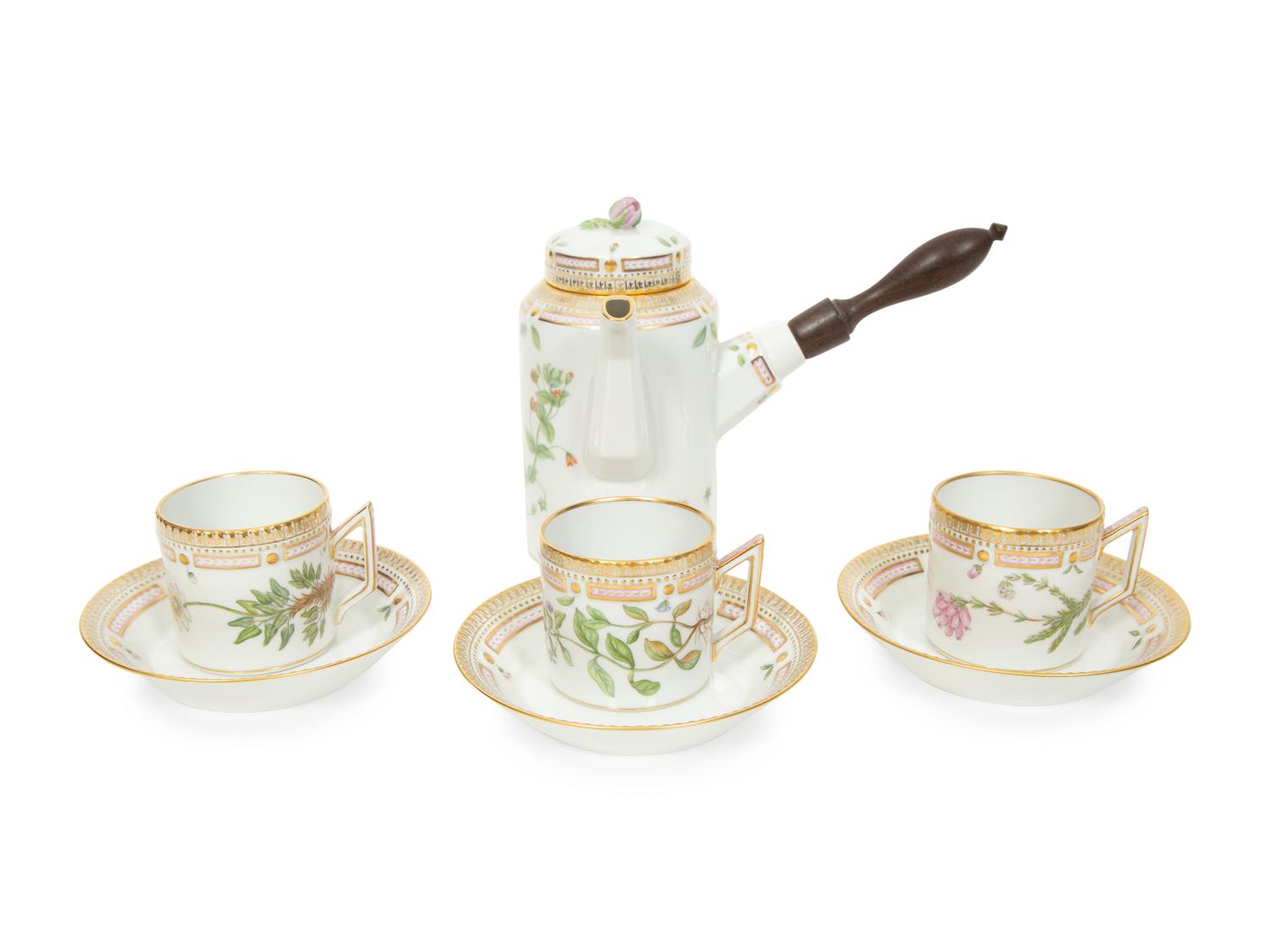 A Royal Copenhagen Flora Danica Porcelain Chocolate Pot with Five Cups and Three Saucers
