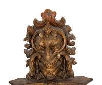 A Pair of Venetian Carved Wood Mask Wall Appliqués
