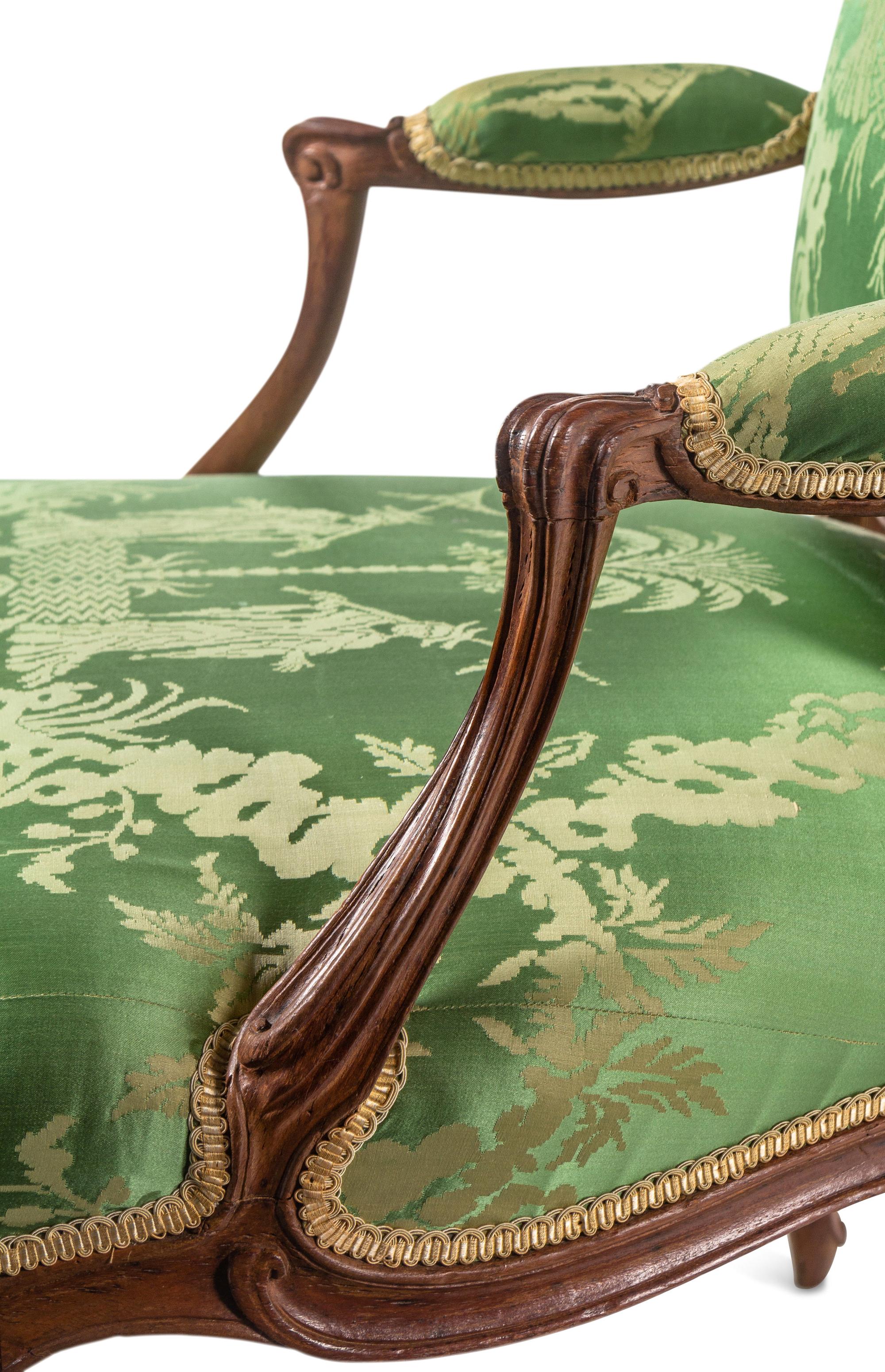 A Pair of Louis XV Beechwood Fauteuils