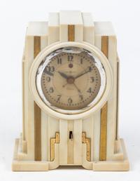 An Art Deco Composite Table Clock Height 7 1/2 inches. — FIRST HALF 20TH CENTURY