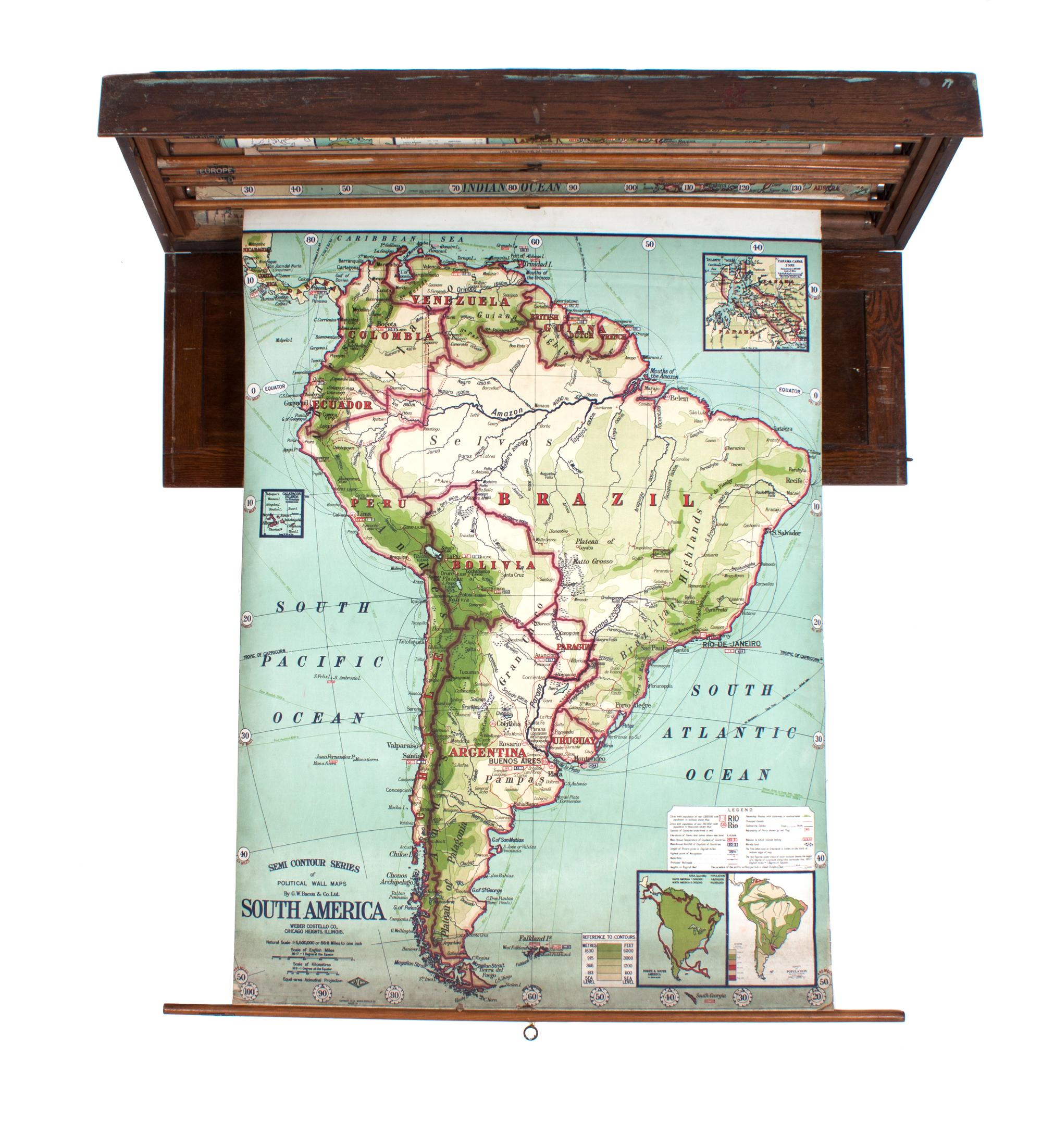 A Cased Set of Schoolhouse Maps Height of case 18 1/2 x width 57 1/4 x depth 5 3/4 inches. — EARLY 20TH CENTURY