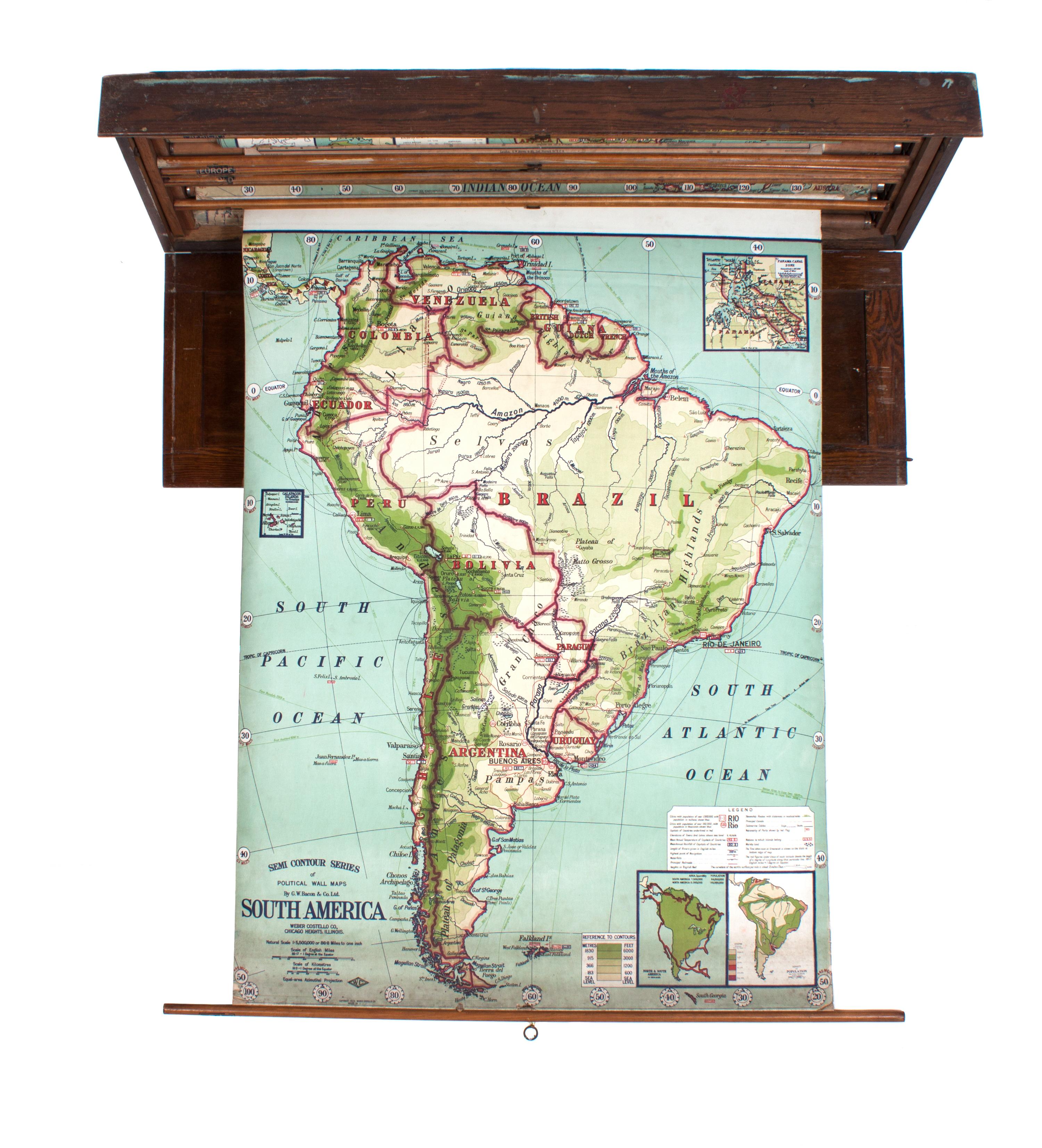 A Cased Set of Schoolhouse Maps Height of case 18 1/2 x width 57 1/4 x depth 5 3/4 inches. — EARLY 20TH CENTURY