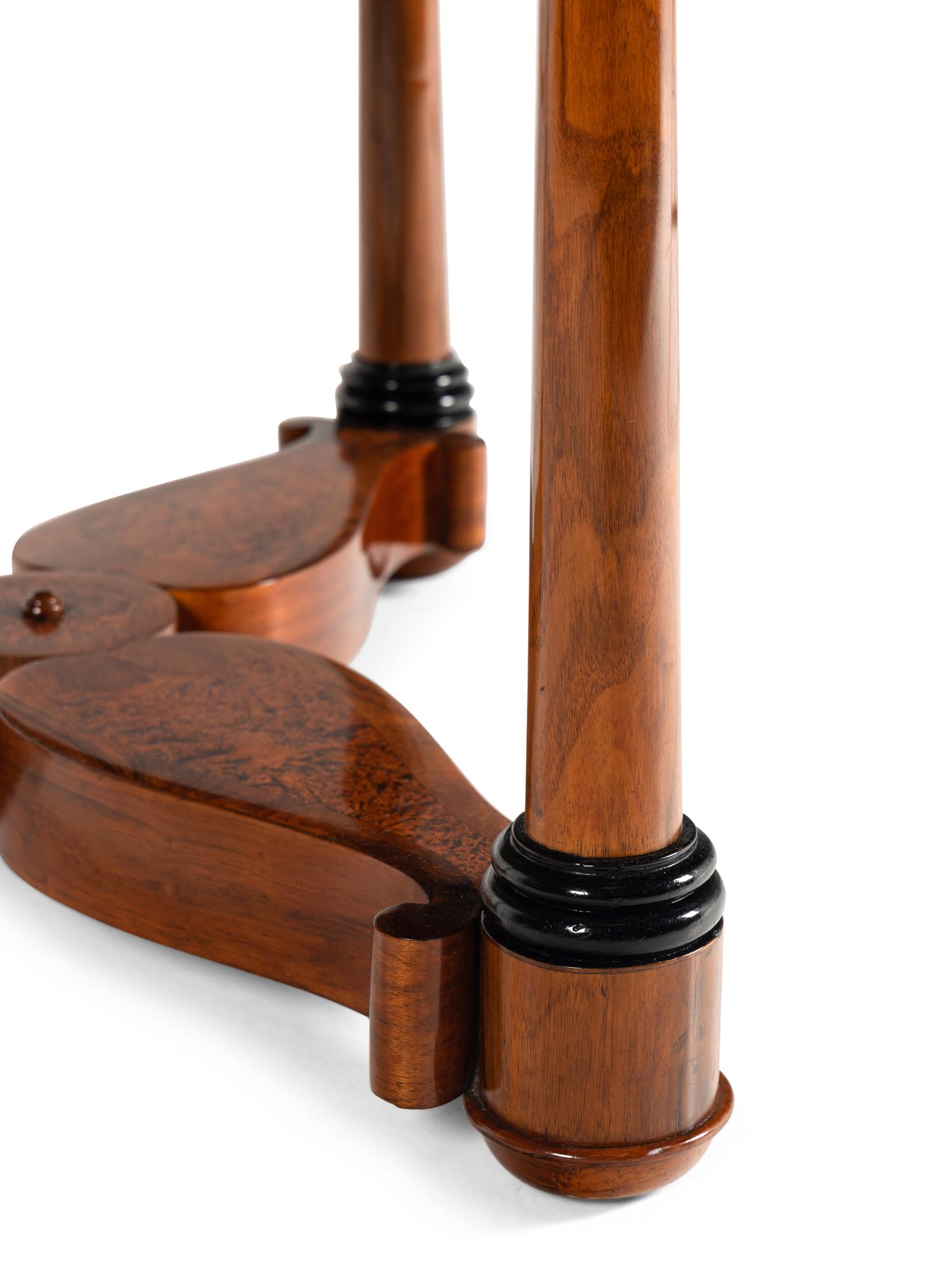 A German Part-Ebonized Walnut and Burl Maple Center Table