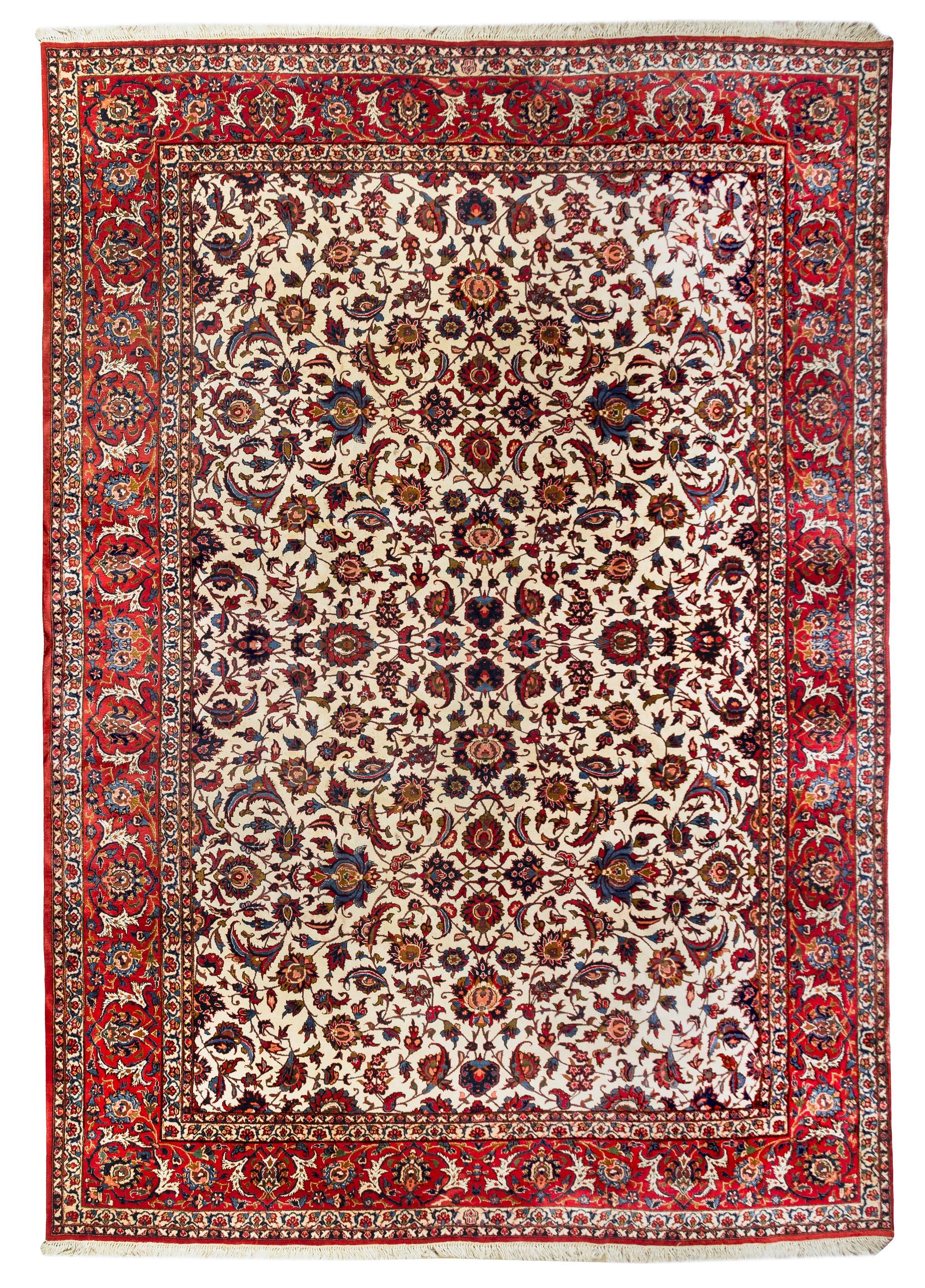 An Isfahan Wool Rug 13 feet 4 inches x 10 feet 7 inches. — 20TH CENTURY