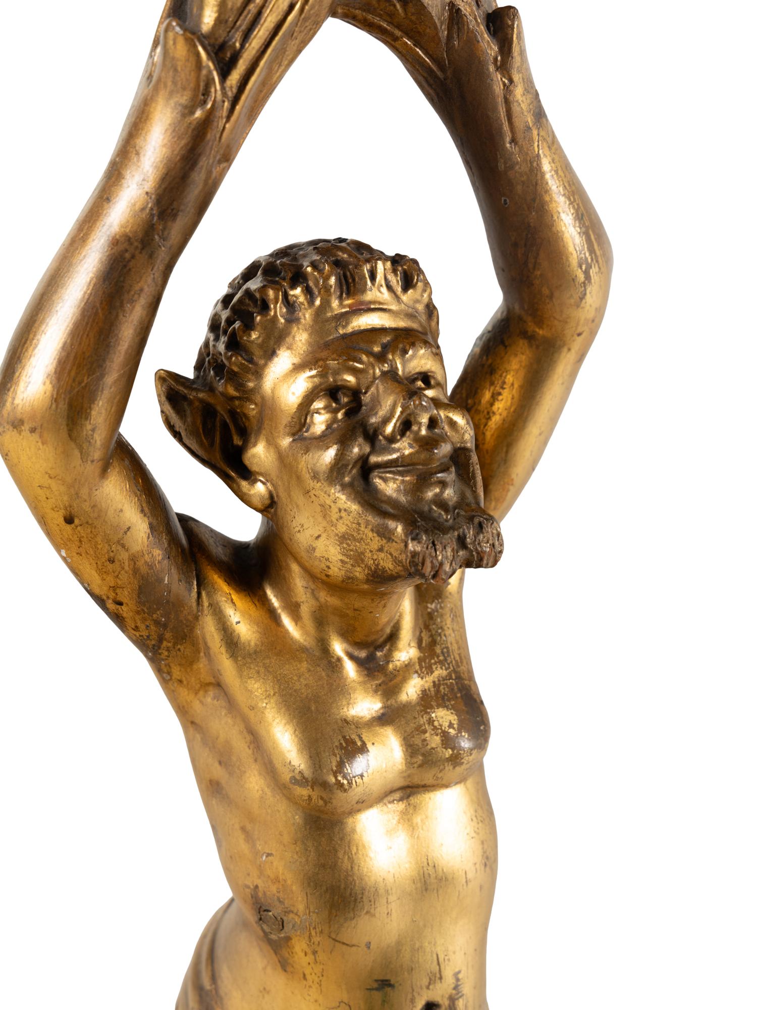 An Italian Carved Giltwood Figural Stand