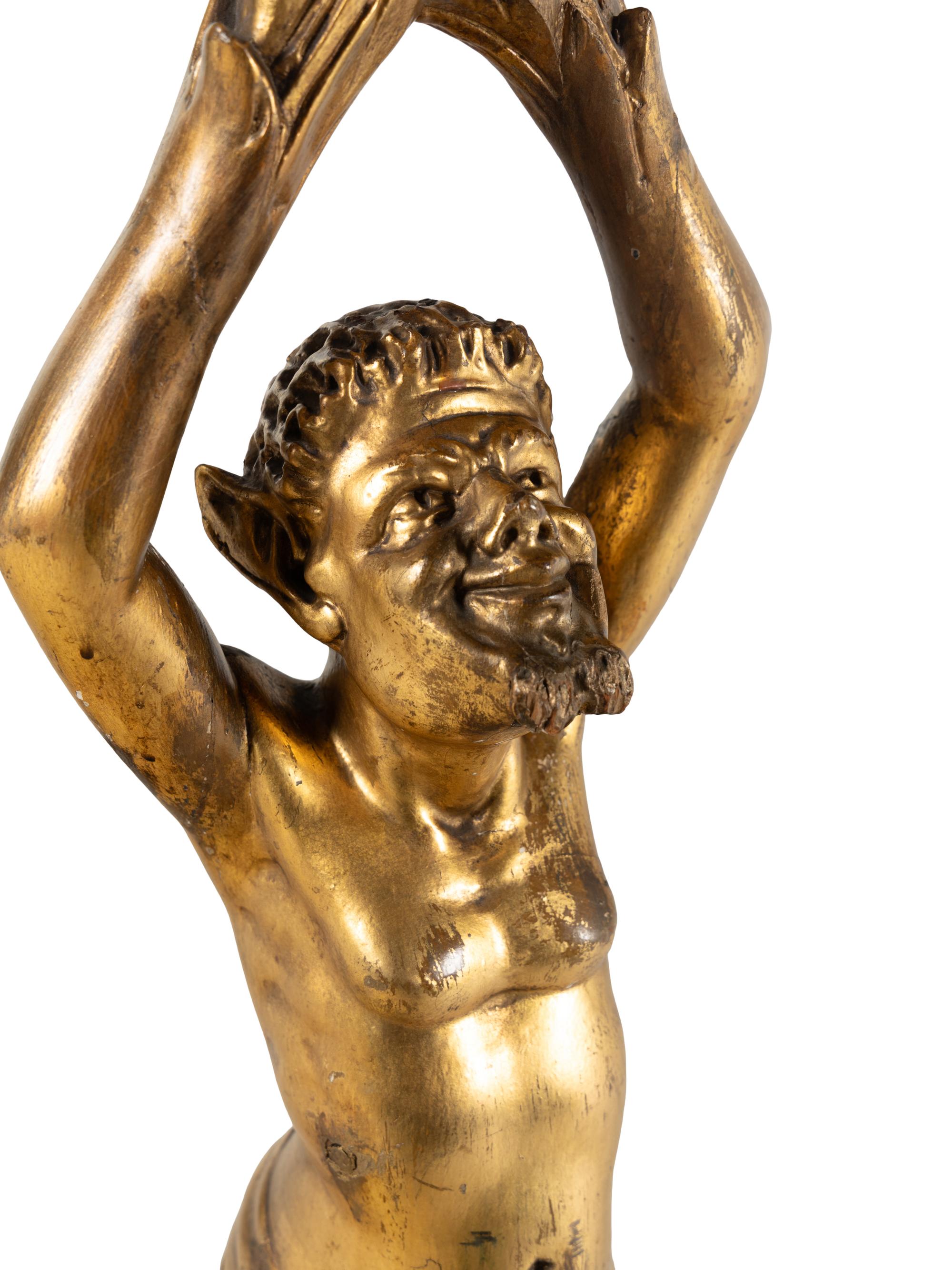 An Italian Carved Giltwood Figural Stand