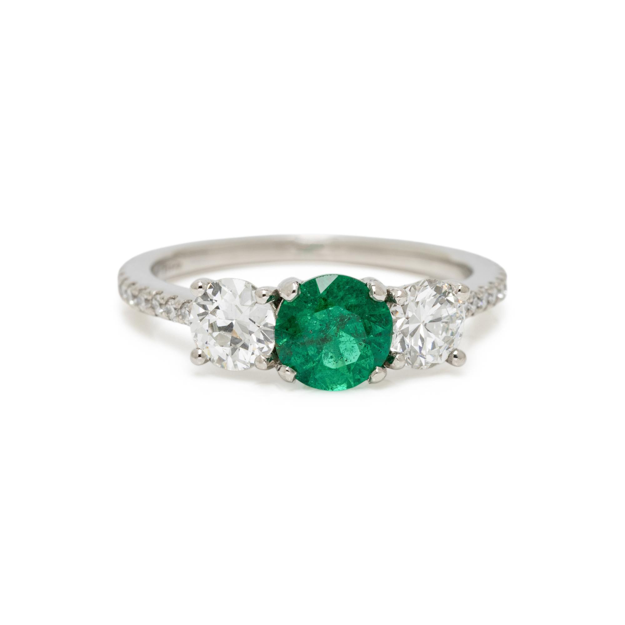EMERALD, DIAMOND, AND PLATINUM RING