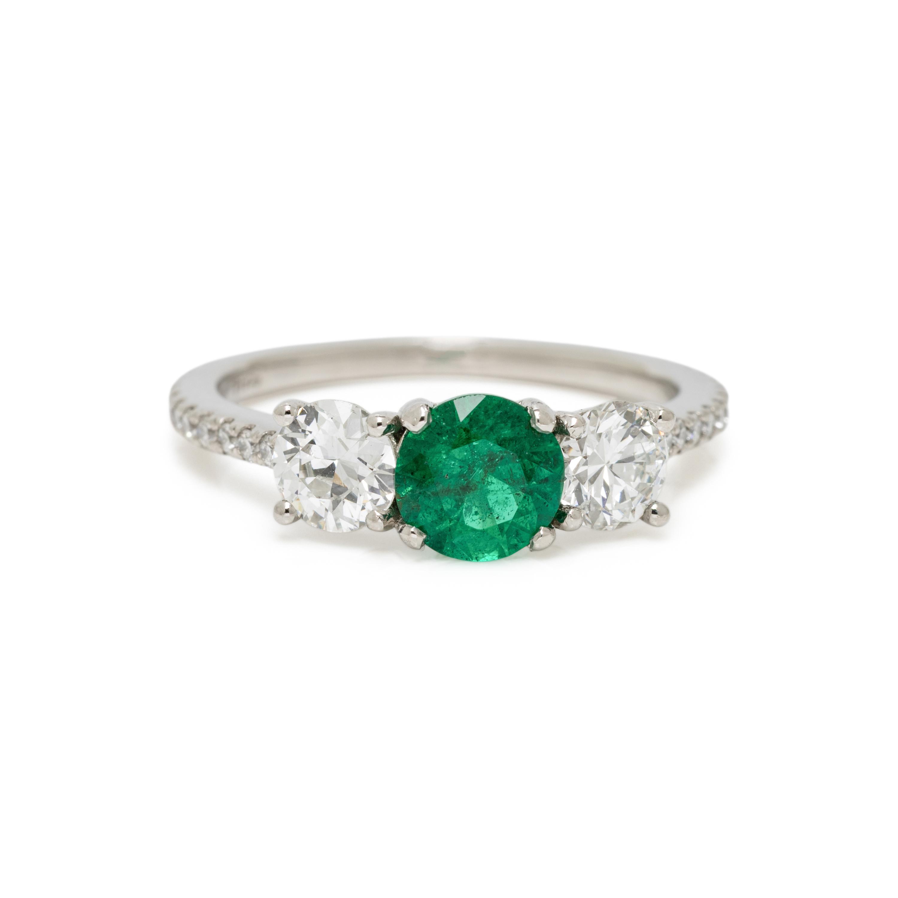 EMERALD, DIAMOND, AND PLATINUM RING