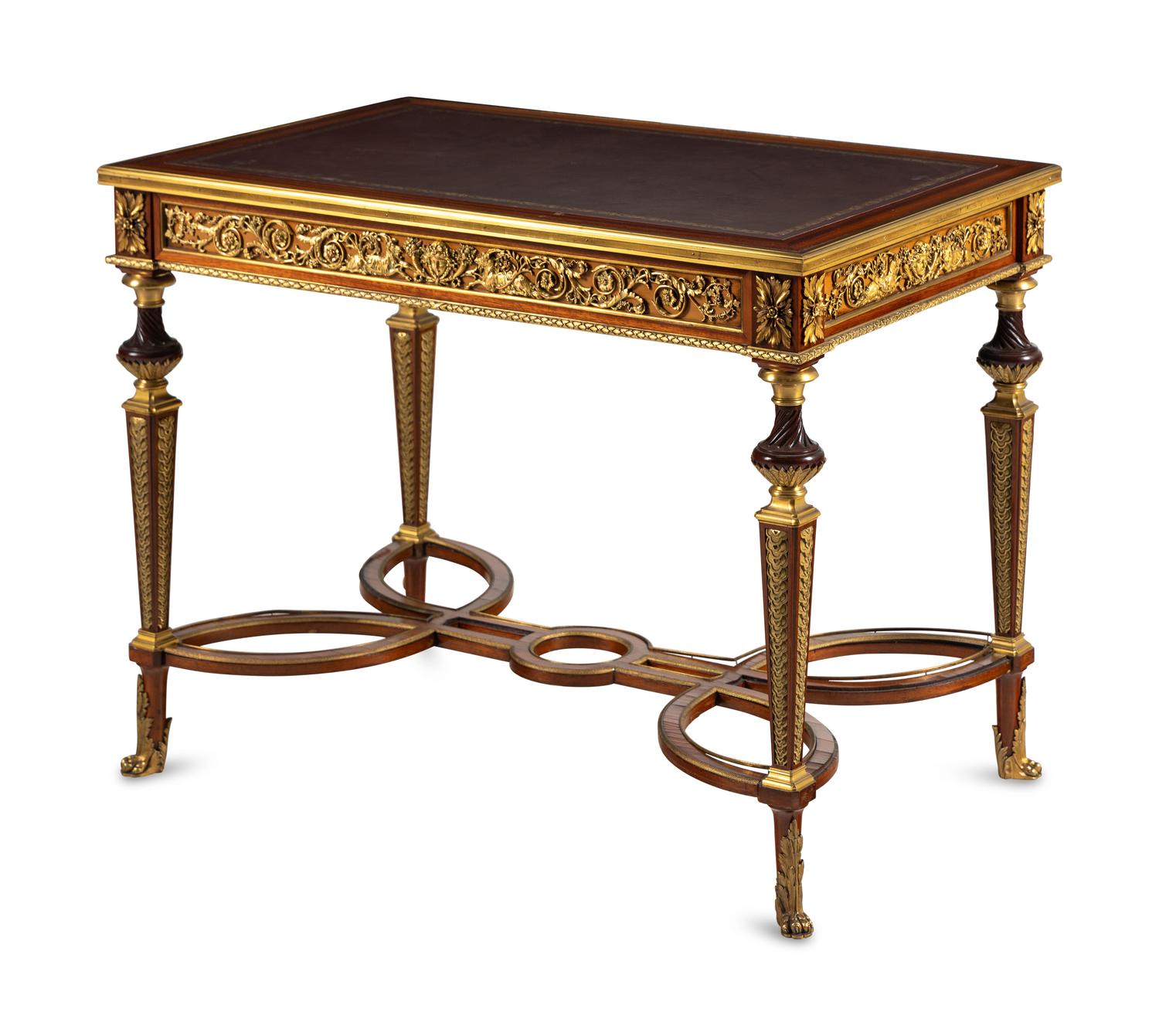 A Louis XVI Style Gilt Bronze Mounted Mahogany Writing Table