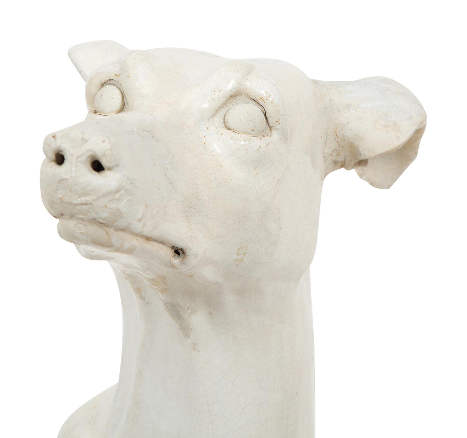 An Italian Glazed Earthenware Greyhound