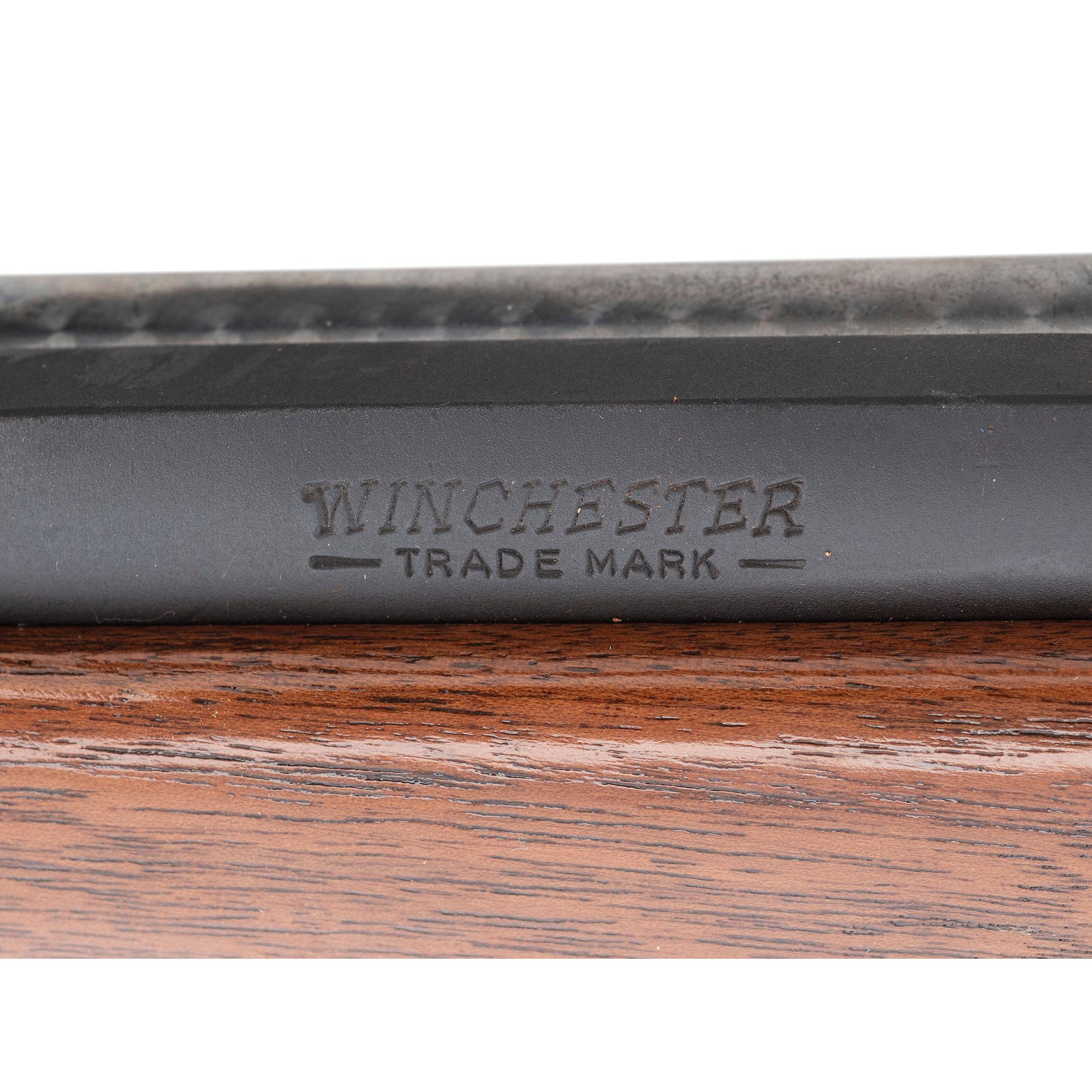 ** Winchester Model 70 with Lyman Alaskan Scope