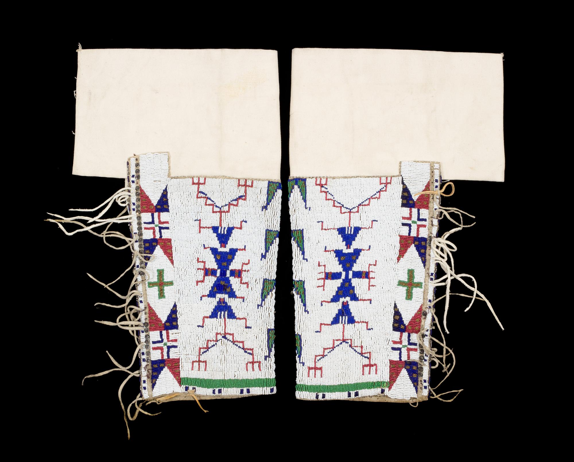 A Pair of Sioux Beaded Leggings Length 17 inches.