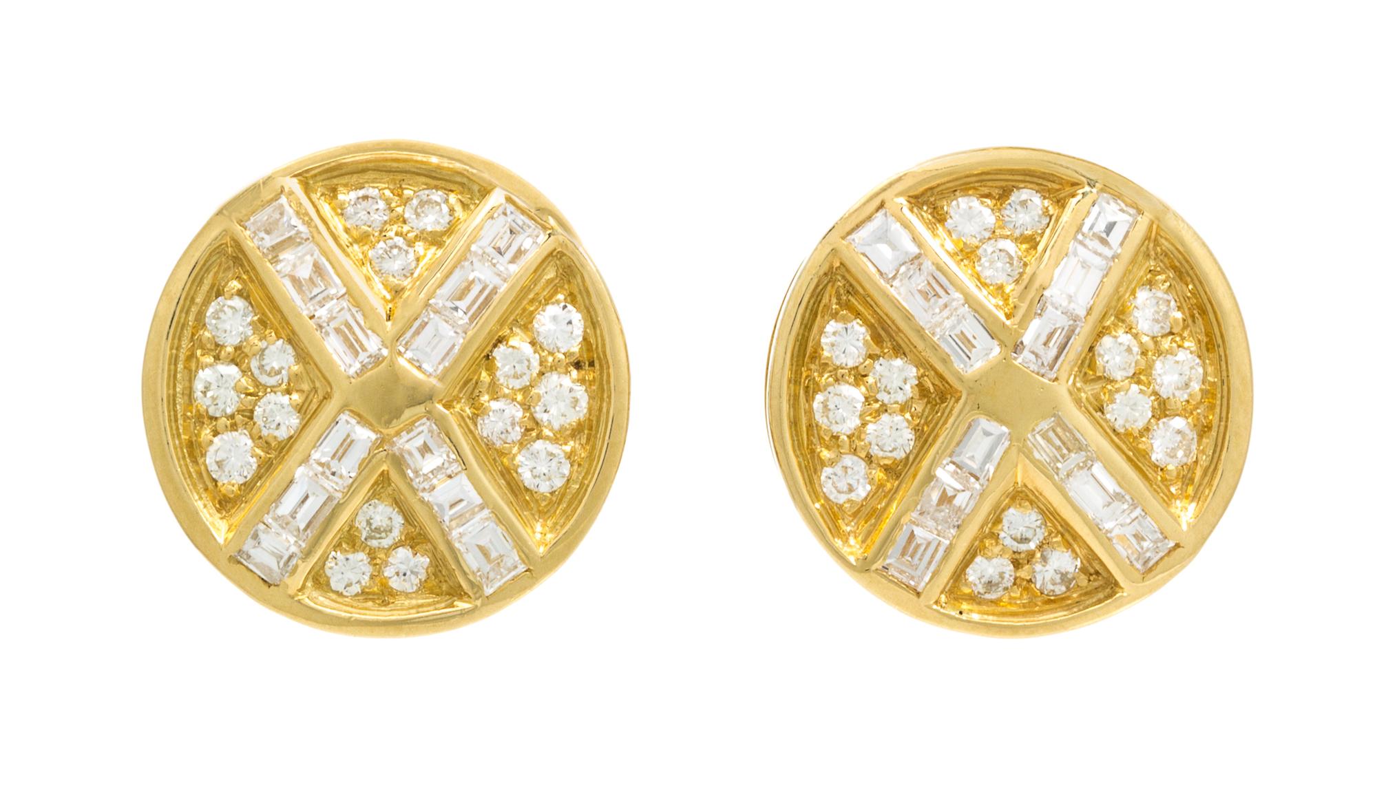 A Pair Of 18 Karat Yellow Gold and Diamond Earclips, 7.90 dwts.